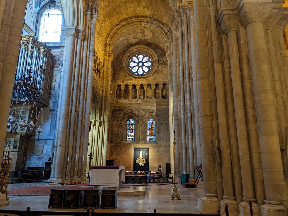 altar in a cathedral flanked by columns